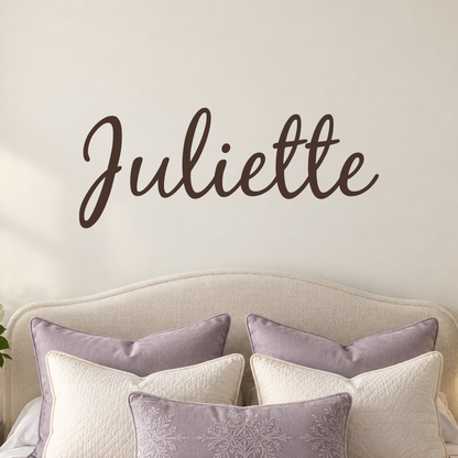 Close-up custom lettering example on a smooth wall