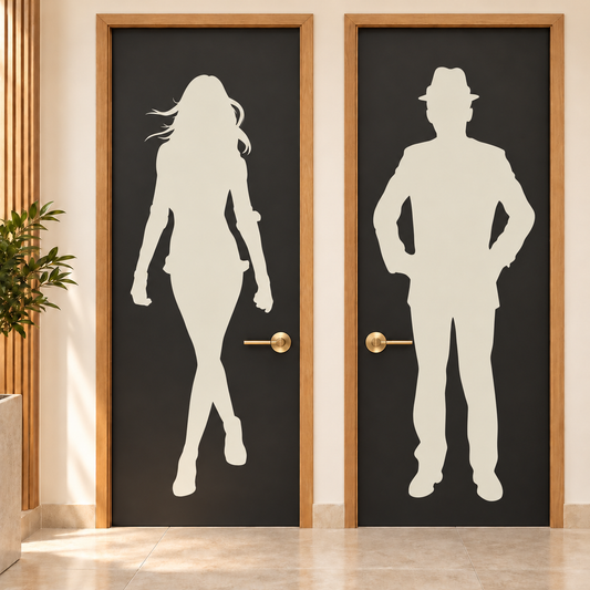 Large cream woman and man restroom decals on charcoal doors with oak trim