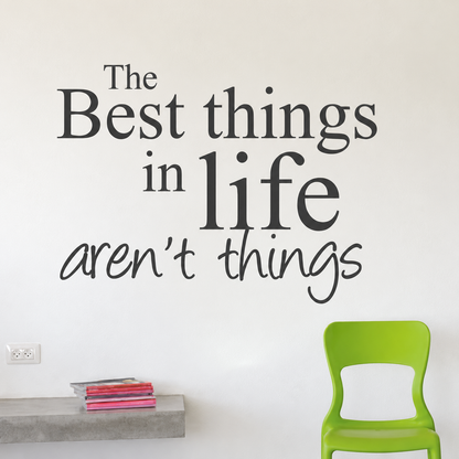 the best things in life aren t things wall quote decal displayed on a wall