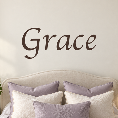 Close-up custom lettering example on a smooth wall
