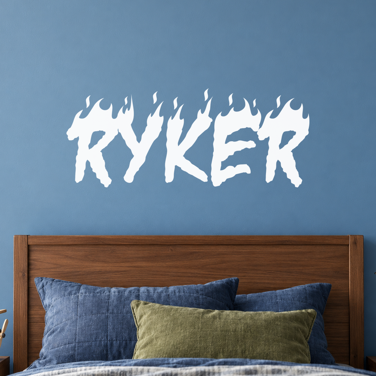 Close-up custom lettering example on a smooth wall
