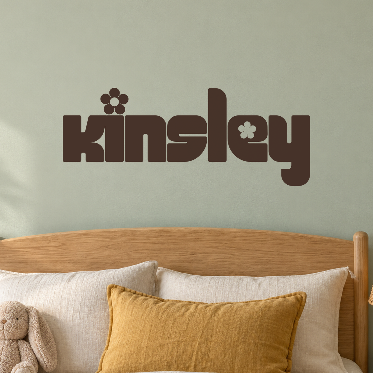 Close-up custom lettering example on a smooth wall