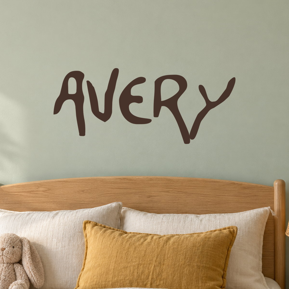 Close-up custom lettering example on a smooth wall