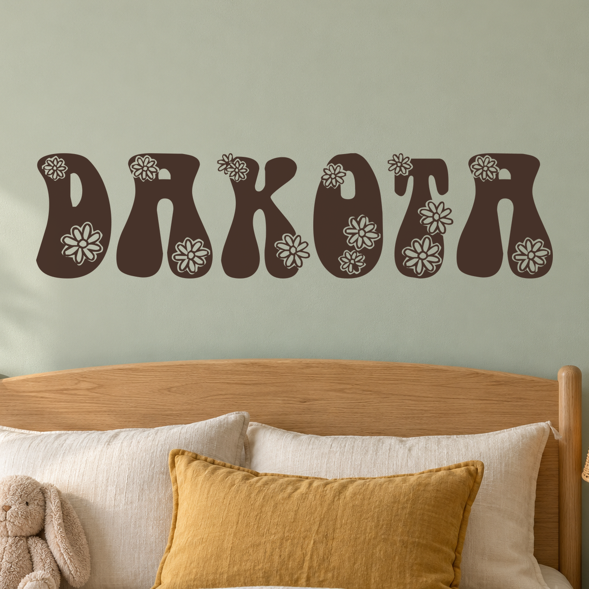 Close-up custom lettering example on a smooth wall