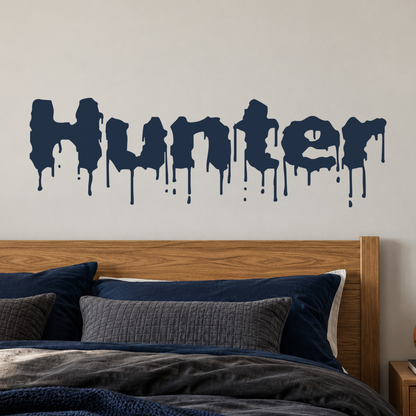 Close-up custom lettering example on a smooth wall